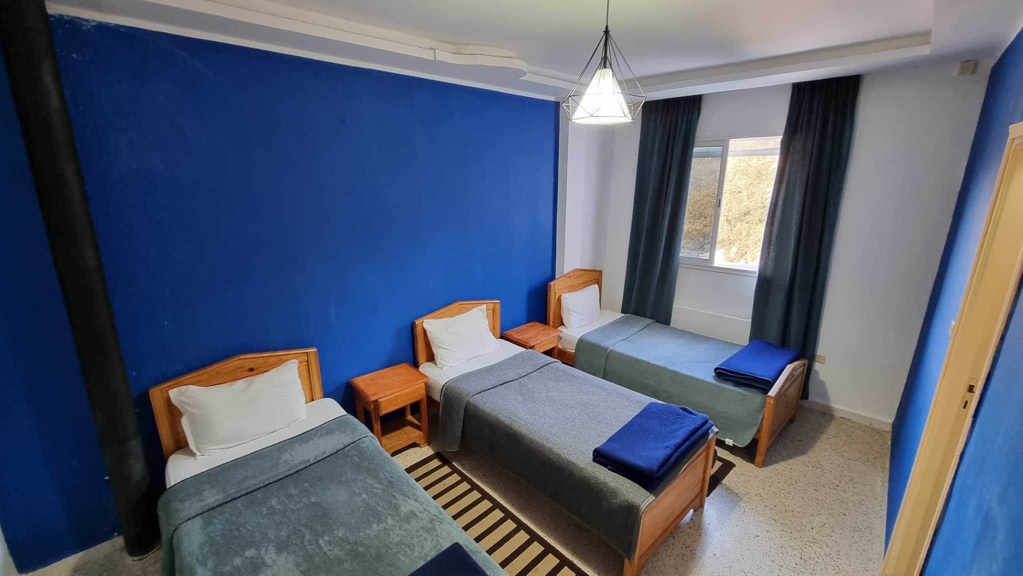 chambre d'hôtel triple " Eco Hôtel Discovery"